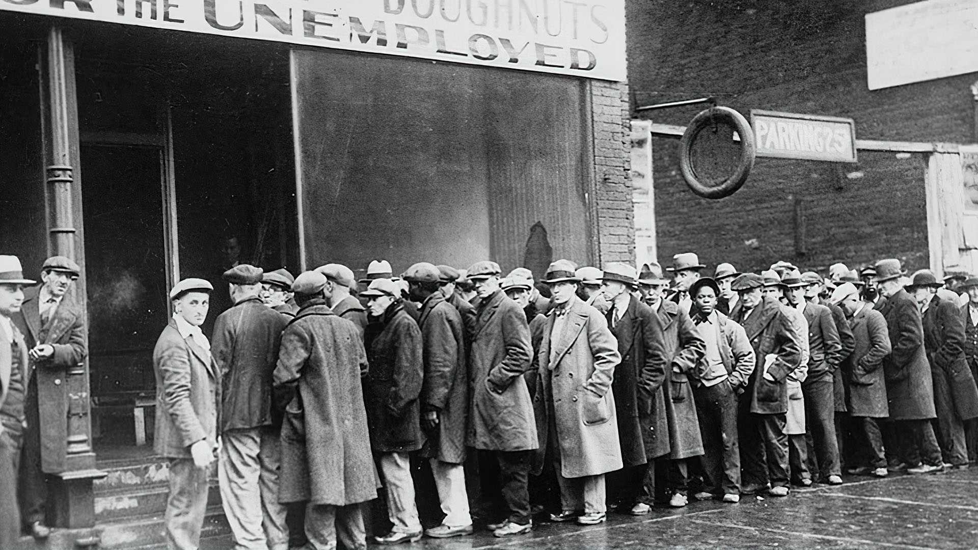 Black and white picture of a line of unemployed people