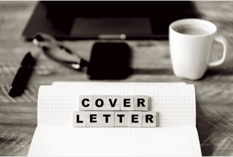 cover letter spelled out on scrabble tiles decorative image