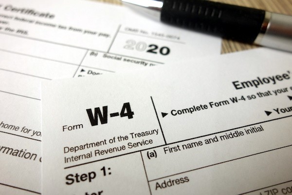 Photo of a W-4, which indicates an exempt vs non-exempt tax situation