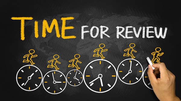 performance review examples illustration of "time for review" and people running on time