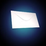 white envelop on a dark black and blue background