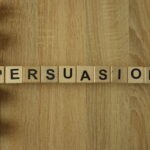 The word ‘Persuasion; on scrabble tiles